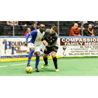 Syracuse Silver Knights Try to Outmuscle the Missouri Comets for the Ball