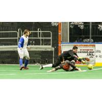 Syracuse Silver Knights and Missouri Comets Scramble for the Ball