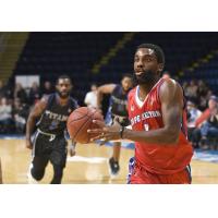 Bruce Massey of the Cape Breton Highlanders heads to the hoop against the KW Titans