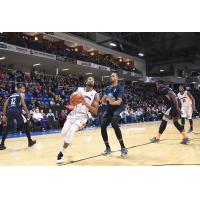 Cape Breton Highlanders drive to the hoop against the Halifax Hurricanes