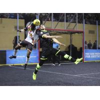 Ibrahima Keita of the Baltimore Blast (left) and a Milwaukee Wave opponent battle for the ball