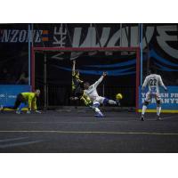 Milwaukee Wave midfielder Ricardinho Sobreira scores against the Kansas City Comets