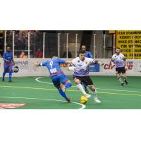 Vini Dantas of the Baltimore Blast with possession against the Kansas City Comets