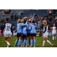 Chicago Red Stars celebrate a goal against the North Carolina Courage