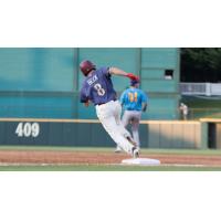 Preston Beck of the Frisco RoughRiders rounds first