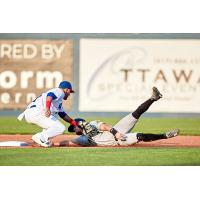 Ottawa Champions apply the tag vs. the Sussex County Miners