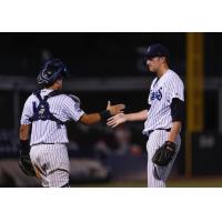 Catcher Jason Lopez and pitcher Daniel Bies of the Tampa Tarpons