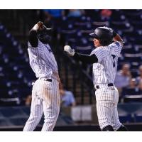 Estevan Florial and Oswaldo Cabrera celebrate for the Tampa Tarpons