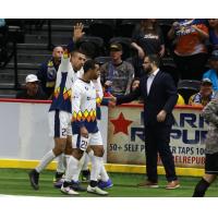 Tacoma Stars coach Adam Becker congratulates Mike Ramos on his second quarter goal during Tacoma's 6-2 loss in San Diego