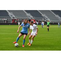 Erica Skroski of Sky Blue FC (left) and Kelley O'Hara of the Washington Spirit