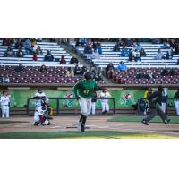 Beloit Snappers outfielder Thomas Jones trots to first in the season opener