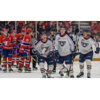 Tri-City Americans react after a goal against the Spokane Chiefs
