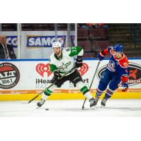 Texas Stars' Joseph Cecconi and Bakersfield Condors' Cam Dineen in action