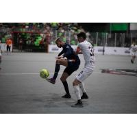 Tacoma Stars' Mike Ramos and Chihuahua Savage's Bryan Macias in action