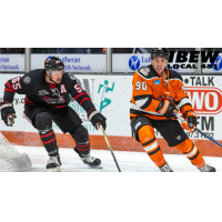 Indy Fuel's Christopher Cameron and Fort Wayne Komets' Xavier Cormier on the ice