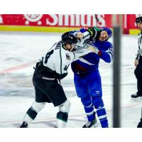 Utah Grizzlies' Cory Thomas grapples with the Witchita Thunder on game night