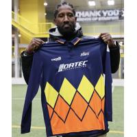 Marcus Trufant holds a Tacoma Stars jersey