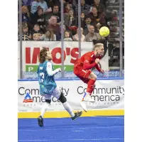 St. Louis Ambush's Curtis Kirby and Kansas City Comets' Zach Reget in action