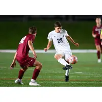 Midfielder Nate Dragisich with Duquesne