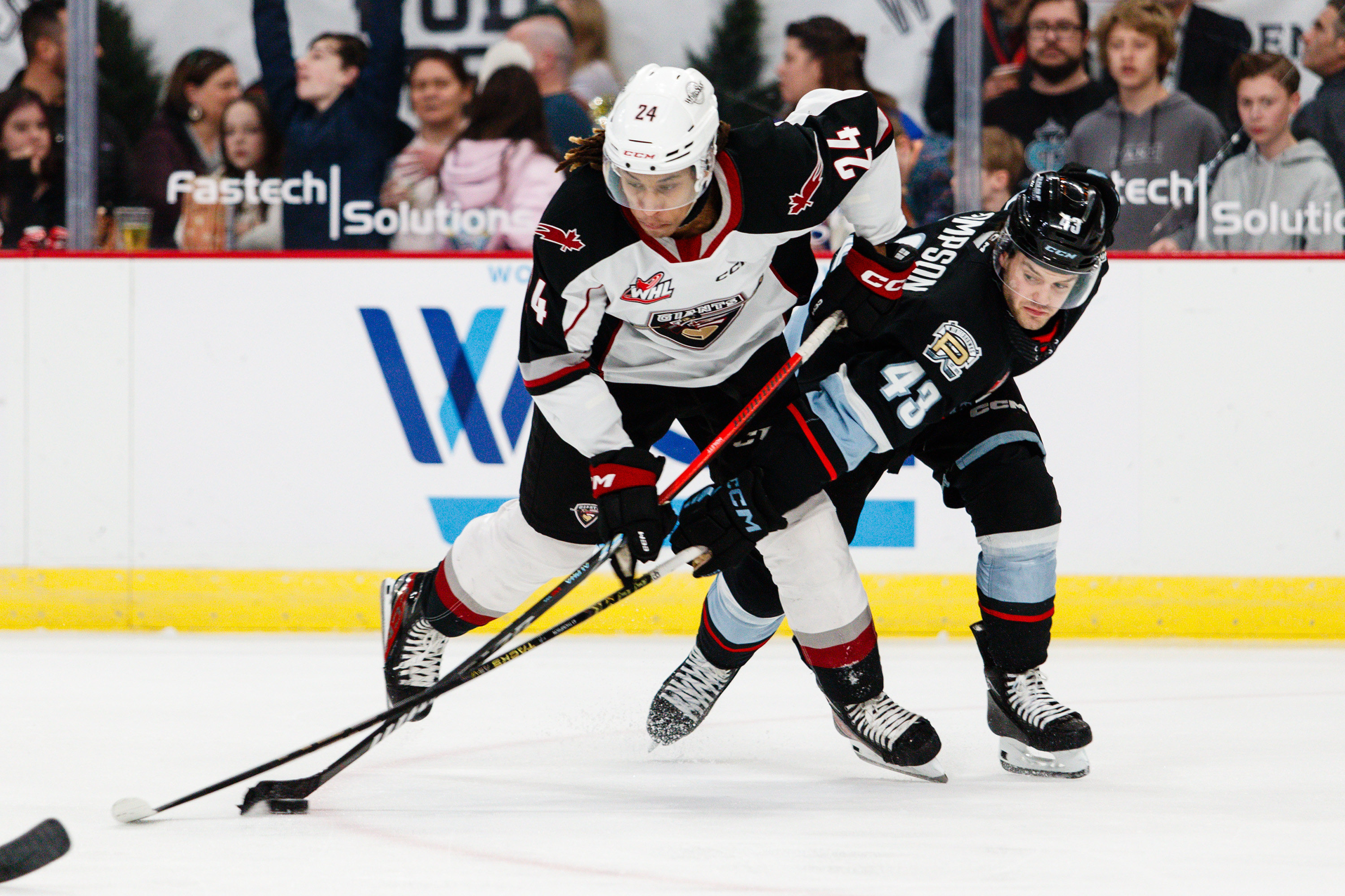 Vancouver Giants' London Hoilett battles Portland Winterhawks' Ryder