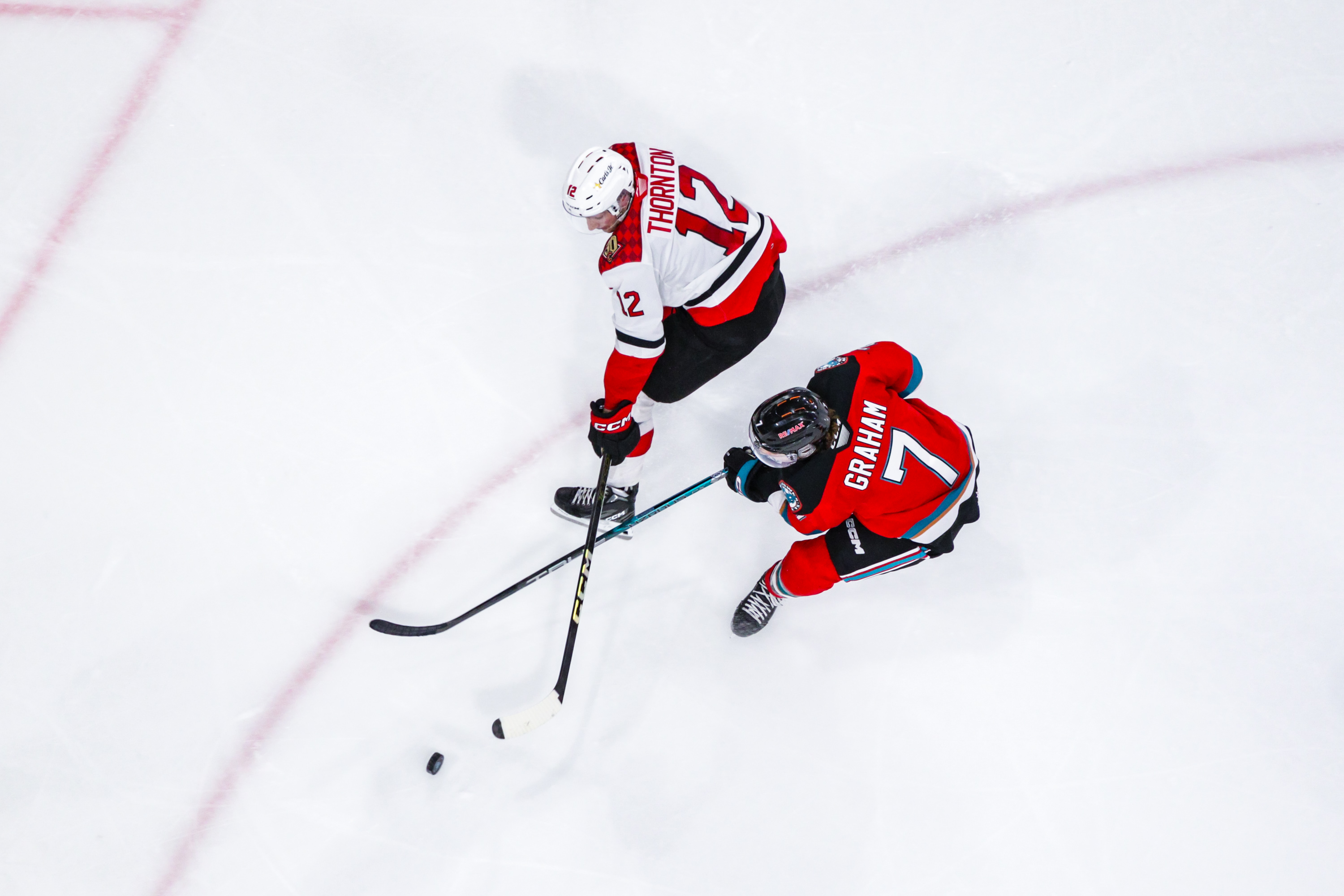 Prince Cougars' Hudson Thornton versus Kelowna Rockets' Max