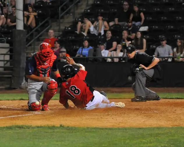 Luke Tendler of the Hickory Crawdads Slides Home