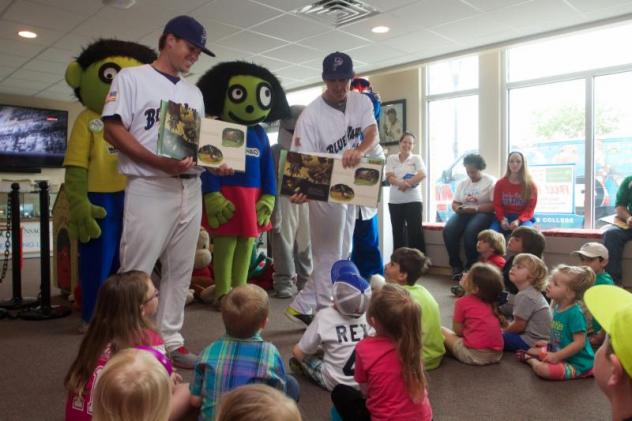 Blue Wahoos Read to Children