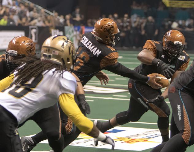 Arizona Rattlers Quarterback BJ Coleman Hands off the Ball vs. the Las Vegas Outlaws