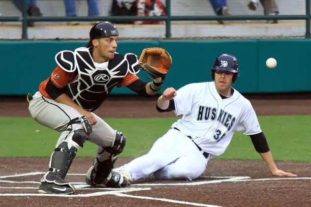 Duluth Huskies Slide Home against the Eau Claire Express