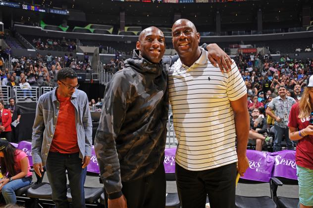 Kobe Bryant and Ervin 'Magic' Johnson at the Los Angeles Sparks Home Opener