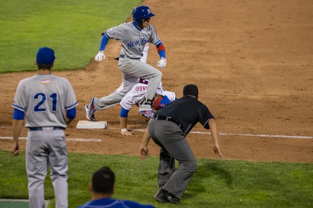 Bryce Massanari of the Ottawa Champions Takes a Blow to the Head
