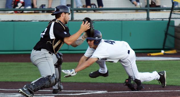 Cal Stevenson of the Duluth Huskies Slides Home