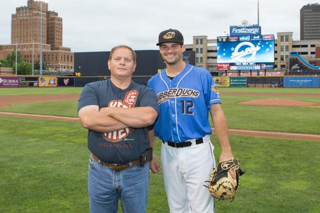 Christopher Lee of C. Lee Services with Akron RubberDucks' Jeremy Lucas