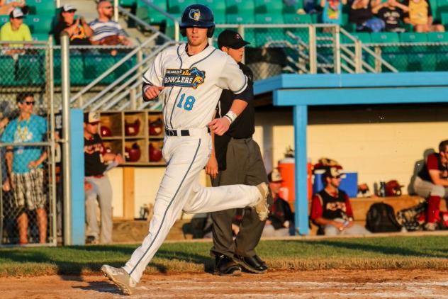 Bryce Adams of the Kalamazoo Growlers Crosses the Plate