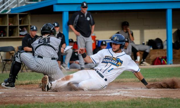 Kory Young of the Kalamazoo Growler Scores a Run