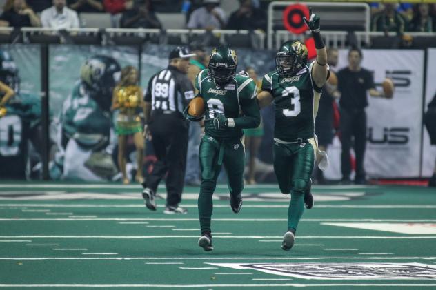 Clevan Thomas (8) and David Hyland (3) of the San Jose SaberCats