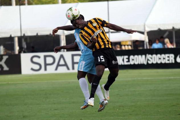 Emmanuel Adjetey of the Charleston Battery vs. Sunny Janeof the Wilmington Hammerheads