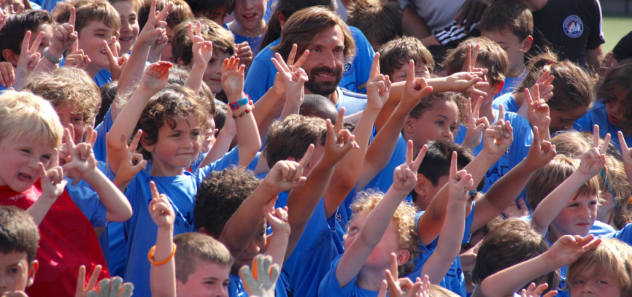 New York City FC's Andrea Pirlo in a Sea of Children