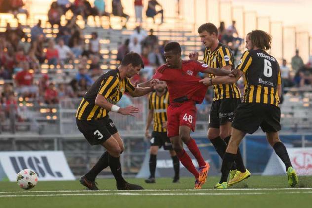 Charleston Battery's Forrest Lasso, Jarad van Schaik and Shawn Ferguson Battle Toronto FC II's Raheem Edwards