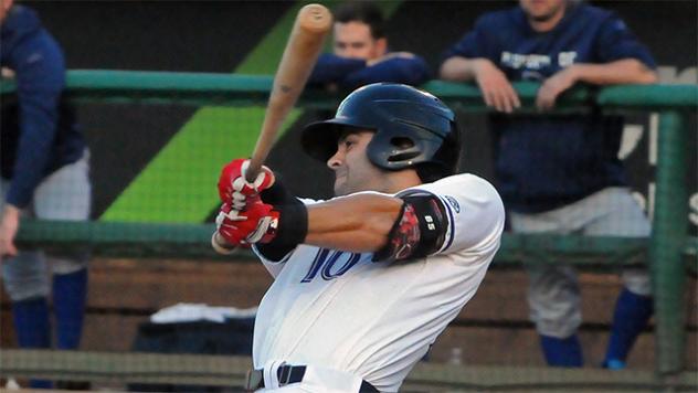 Ryan LaMarre of the Louisville Bats Follows through on Home Run Swing