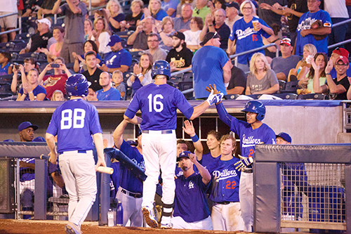 Lars Anderson of the Tulsa Drillers Congratulated in the Dugout