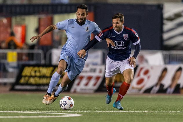 Minnesota United's Ibson Battles Dylan Mares of Indy Eleven