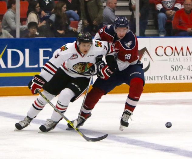 Tri-City Americans Battle Portland Winterhawks for the Puck