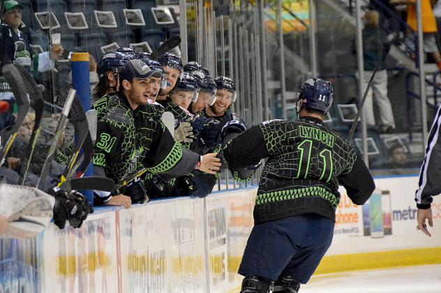 Kevin Lynch is Congratulated by his Florida Everblades Teammates