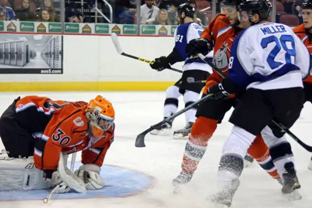 Missouri Mavericks Goaltender Josh Robinson Smothers a Wichita Thunder Shot