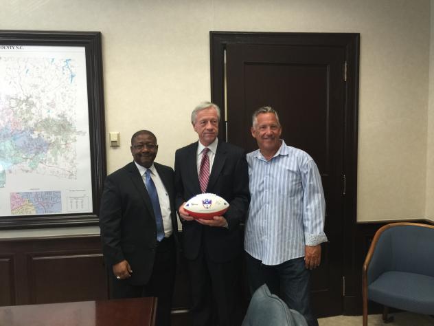 Winston Wildcats Owner Roderick Hinton, Winston-Salem Mayor Allen Joines and AIF Commissioner John Morris