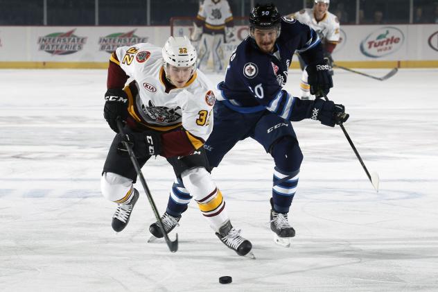 Ivan Barbashev of the Chicago Wolves vs. the Manitoba Moose