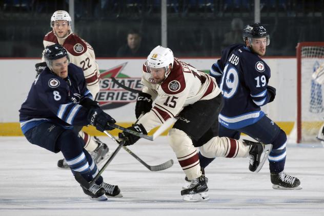 Jeremy Welsh of the Chicago Wolves Skates through the Manitoba Moose