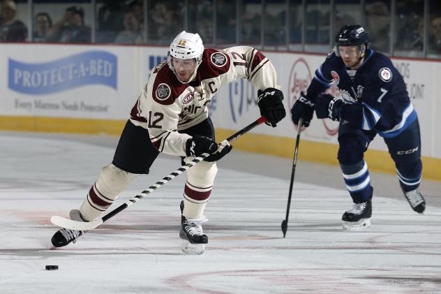 Pat Cannone of the Chicago Wolves vs. the Manitoba Moose