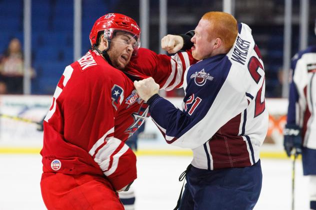 Dyson Stevenson of the Allen Americans and Ben Walker of the Tulsa Oilers Exchange Punches